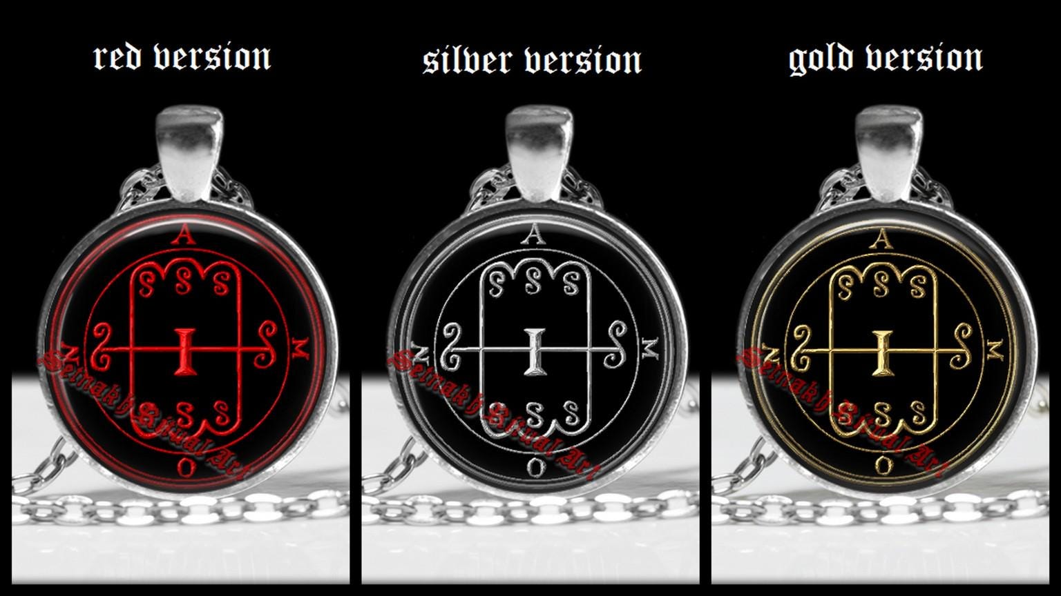 three pendants with different designs on them