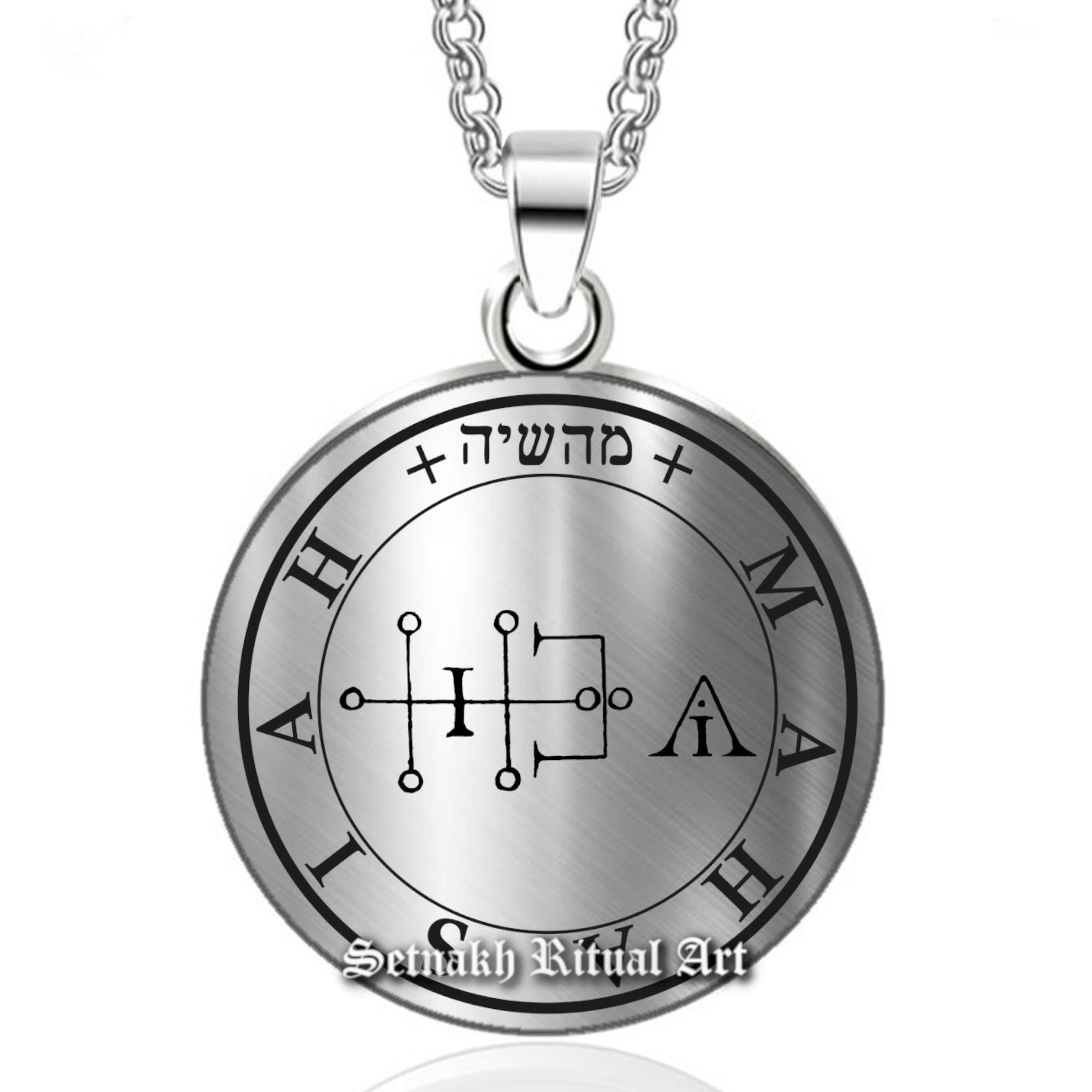 a silver necklace with an image of a wheel of fate on it