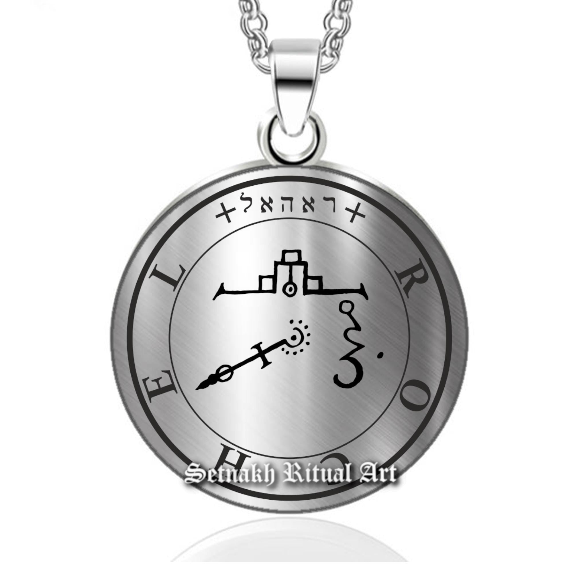 a silver necklace with a zodiac sign on it