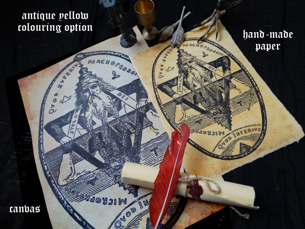 a hand-made paper with an antique yellow colouring option, along with a feather quill and a small glass object.