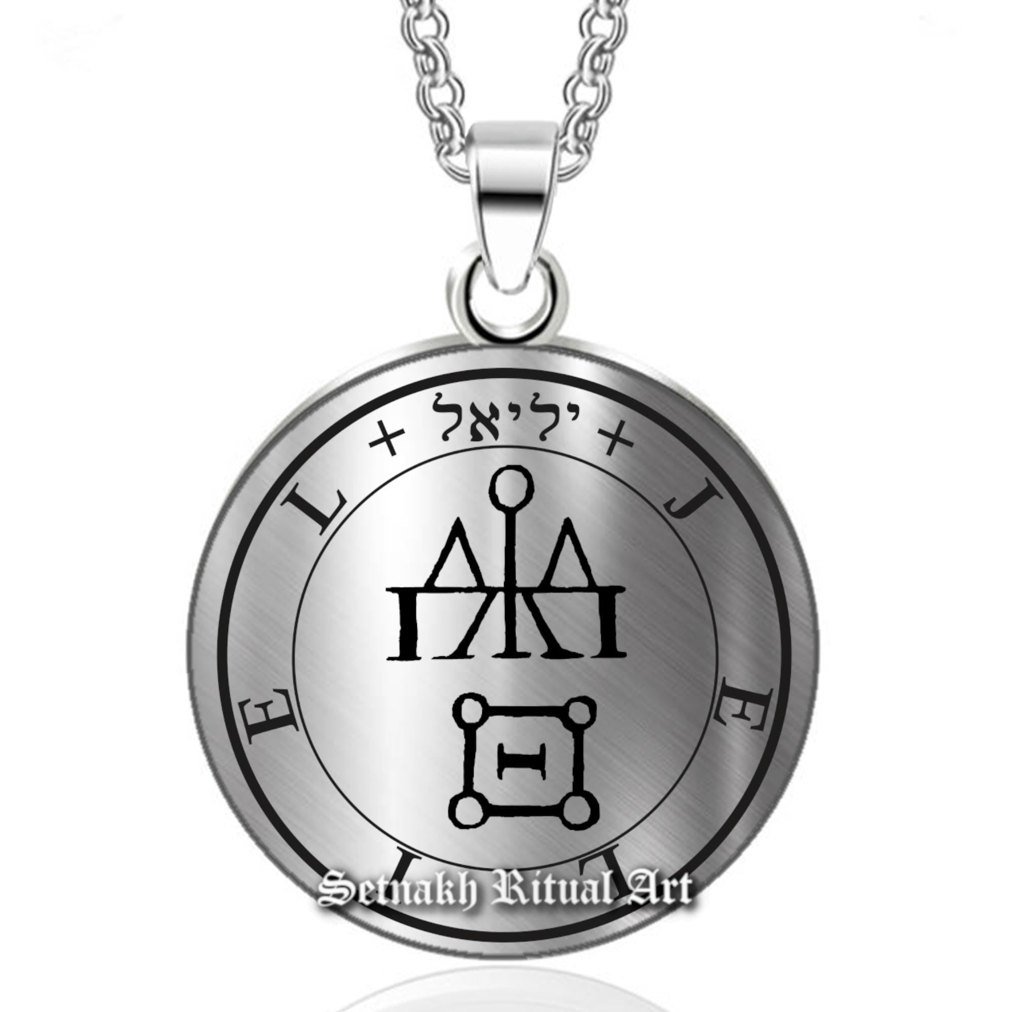 a silver necklace with an image of a wheel of fate on it