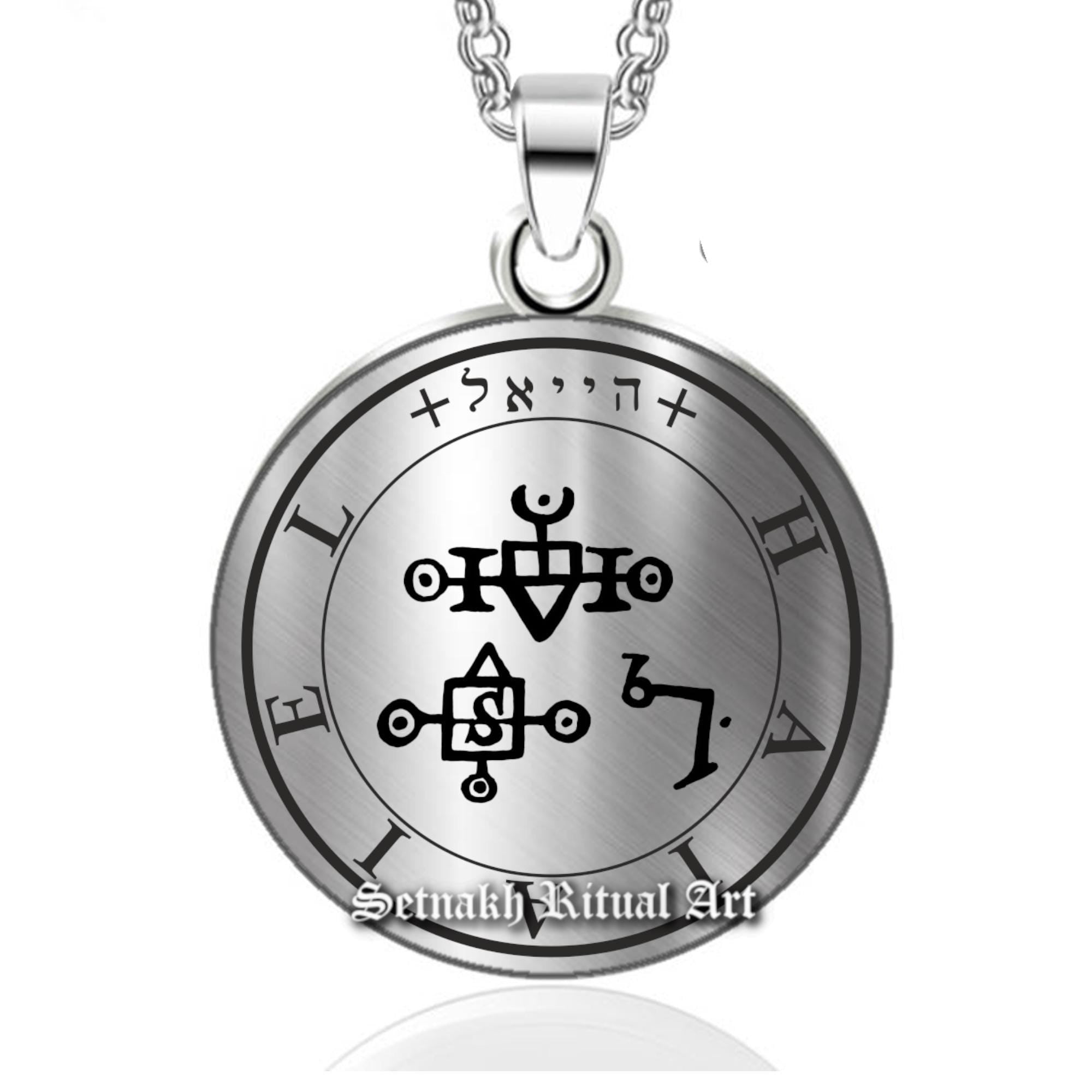 a silver necklace with an image of a clock on it