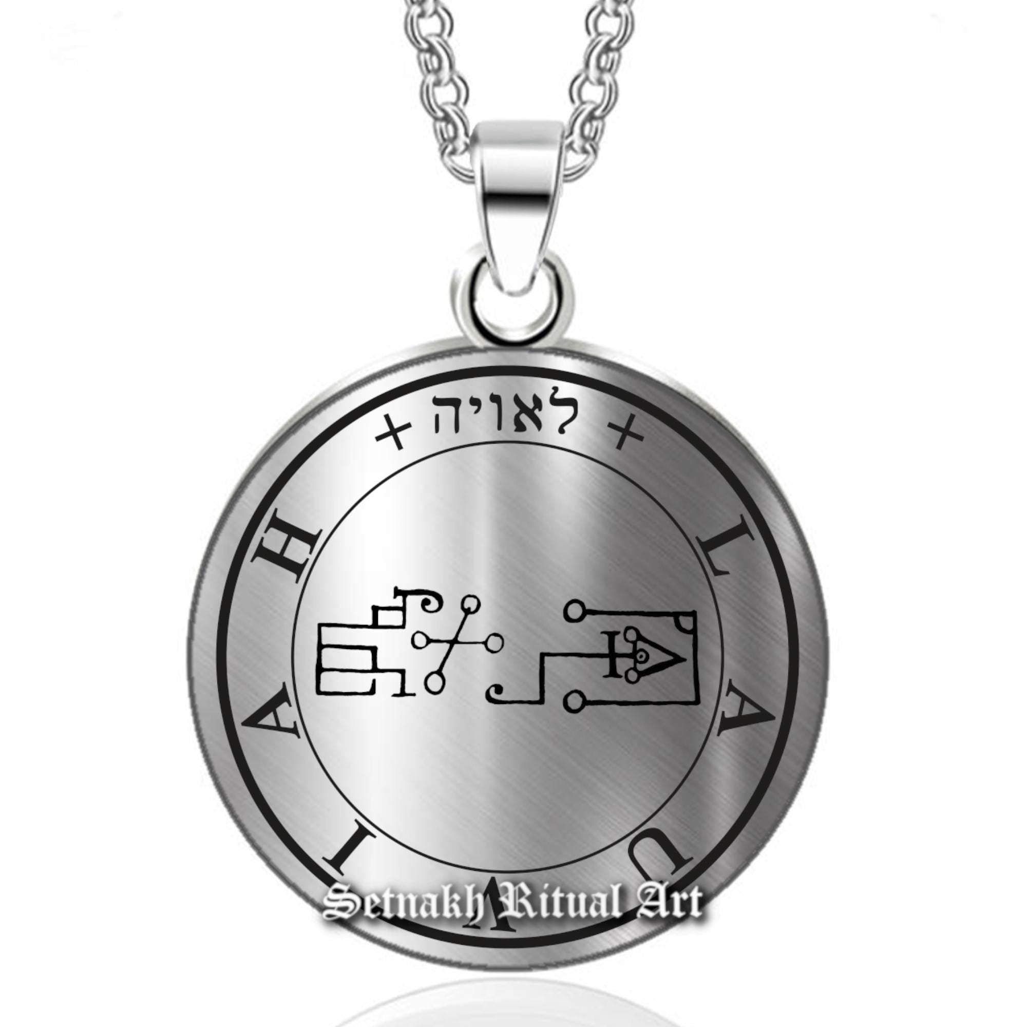 a silver necklace with an inscription on it